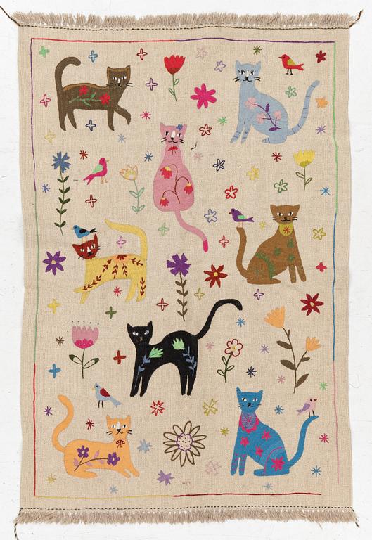 A hand-embroidered Kelim rug, 180 x 122 cm.