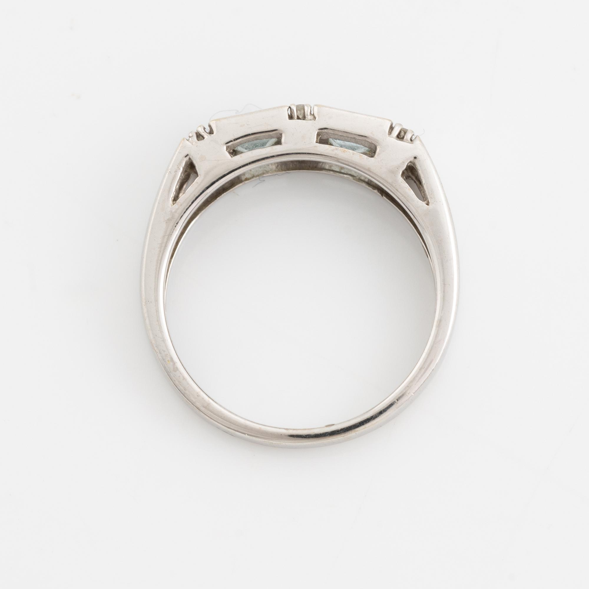 Ring, pendant, and a pair of earrings, 18K white gold with topaz and small diamonds.