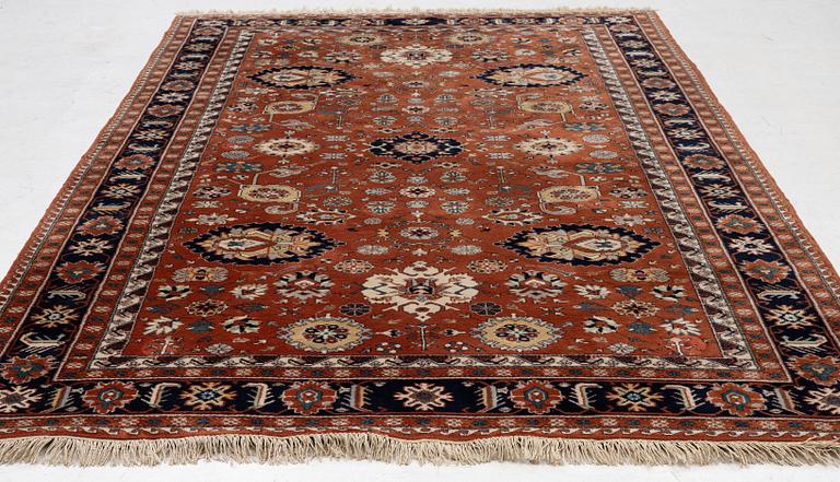 A semi-antique Orientall carpet c. 318 x 202 cm.