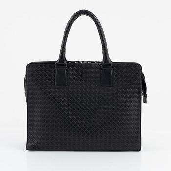 Bottega Veneta, a black leather briefcase.