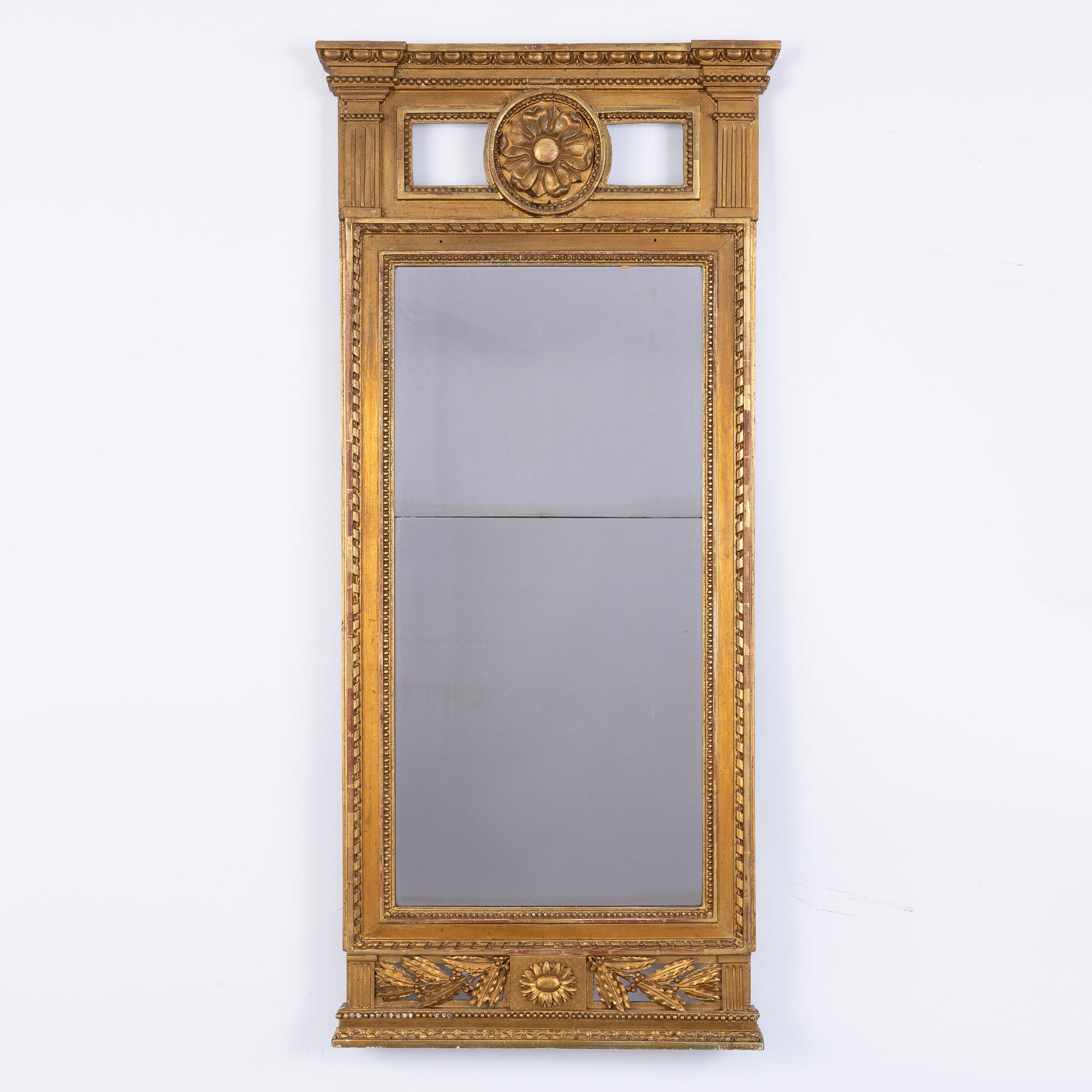 A late Gustavian mirror, circa 1800.