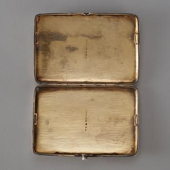 A Swedish early 20th century parcel-gilt cigarette-case, marked  C.G. Hallberg, Stockholm 1901.