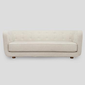 Flemming Lassen, sohva, "Vilhelm", valmistaja Audo Copenhagen. Uustuotanto. Muotoiltu 1935.