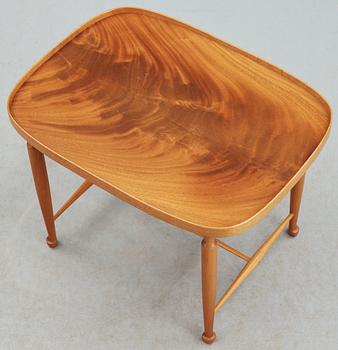 A Josef Frank oval mahogany table,