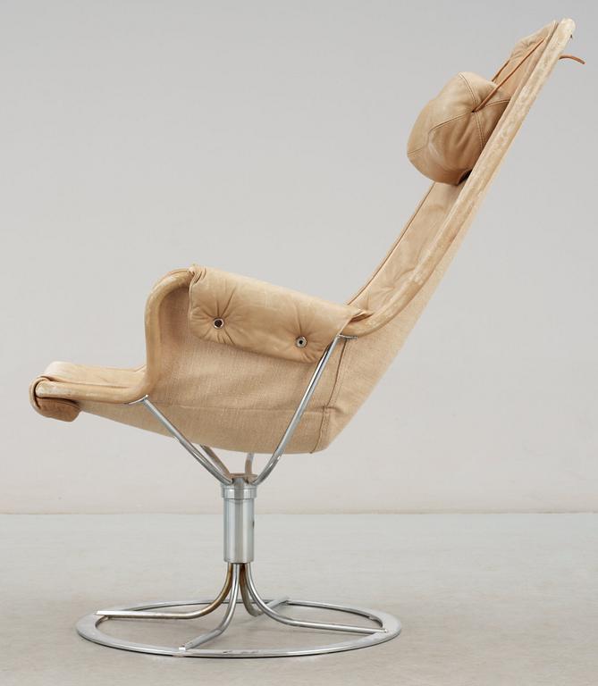 A Bruno Mathsson beige leather and chromed steel 'Jetson' easy chair, DUX.