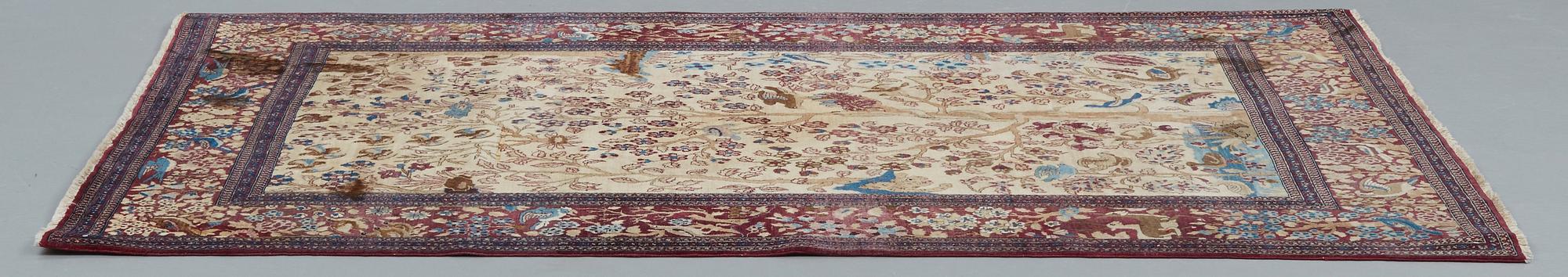 A RUG, a semi-antique Esfahan probably, figural, ca 214,5 x 137,5 cm.