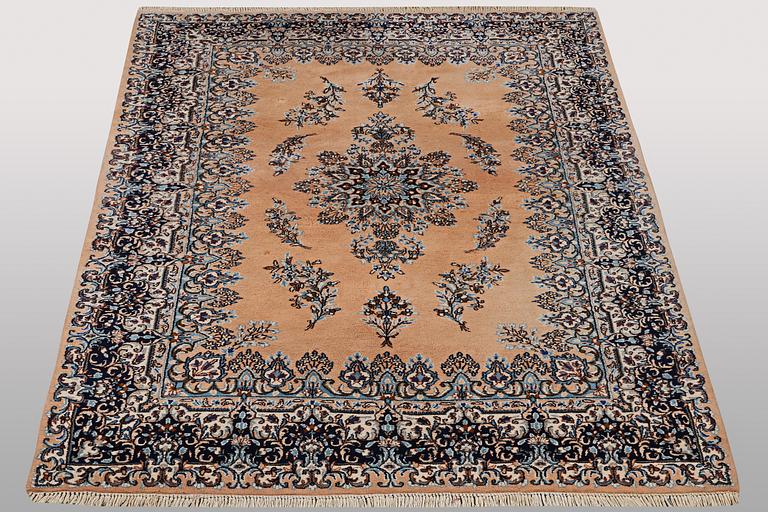 A carpet, Kerman, ca 352 x 188 cm.