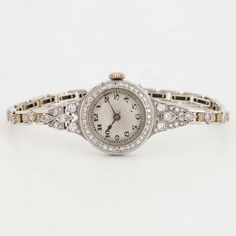 White gold and diamond ladies watch.