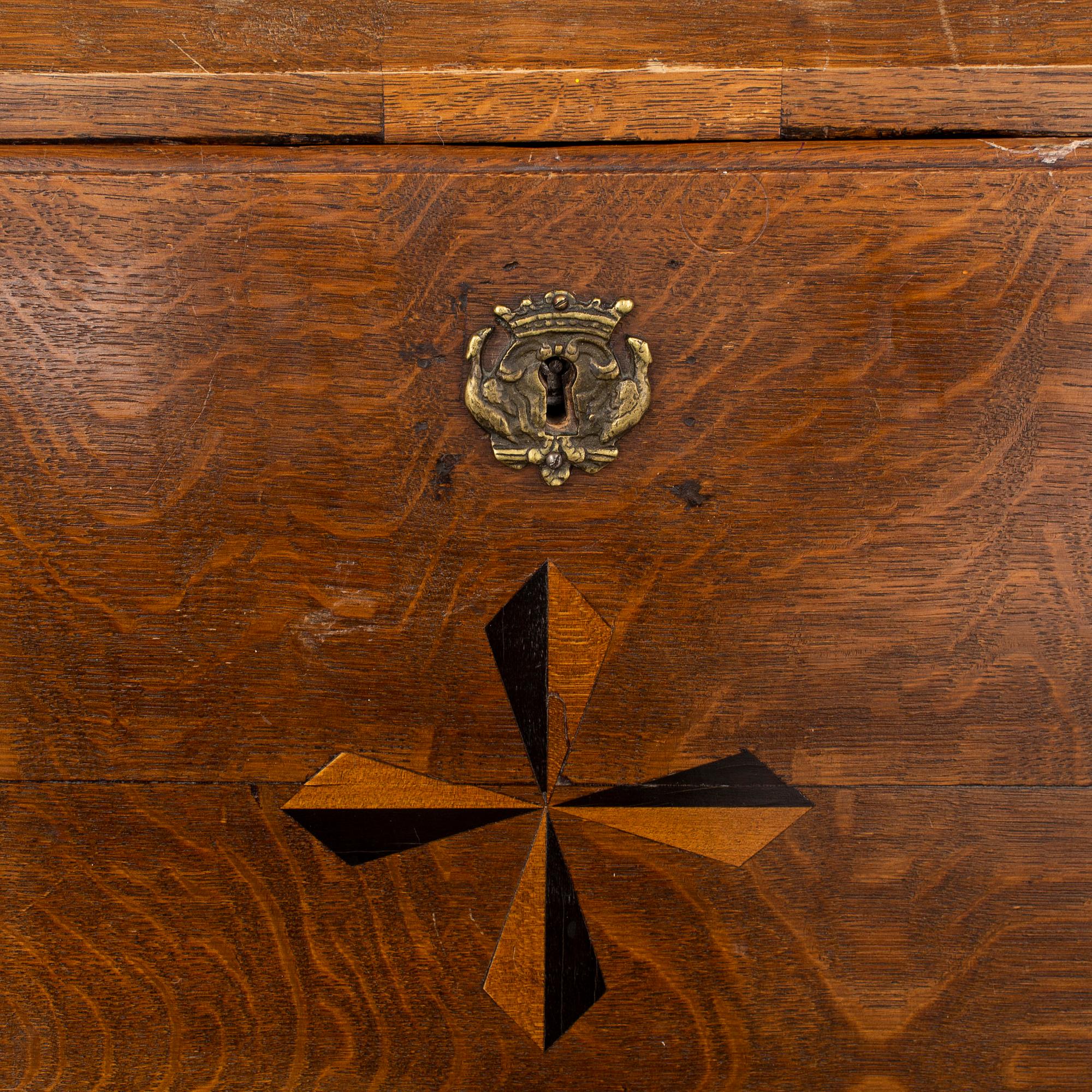A mid 18th century oak secretaire.