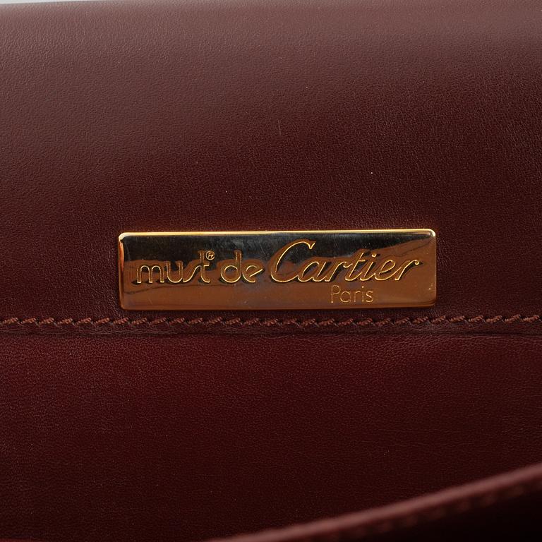 Cartier, a briefcase.