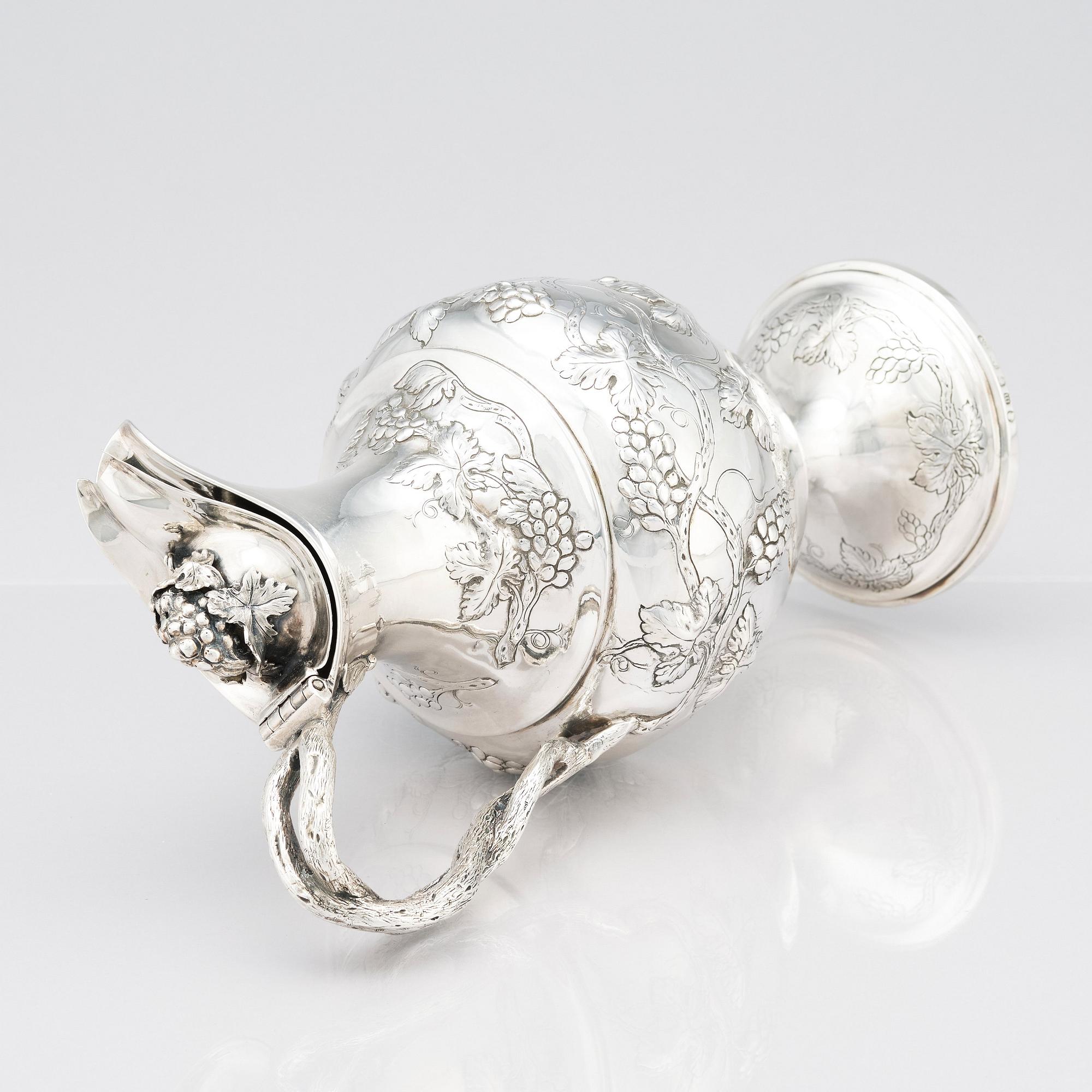 A George III sterling silver ewer, marks of John Scofield, London 1787.