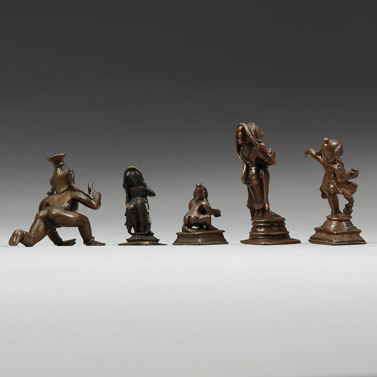 A group of five Indian copper alloy figures of hannuman and krisna, 18th Century and older.