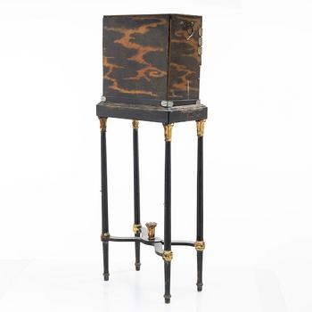 A maki-e cabinet on stand, Japan, 19th century.