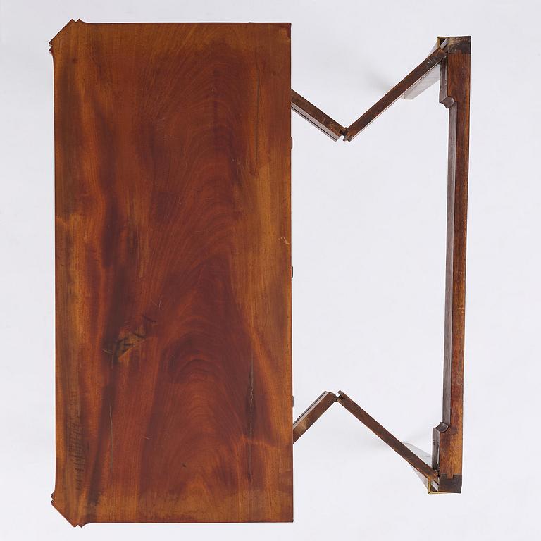 A Gustavian 'concertina action' mahogany games table by Georg Haupt (master in Stockholm 1770-84).