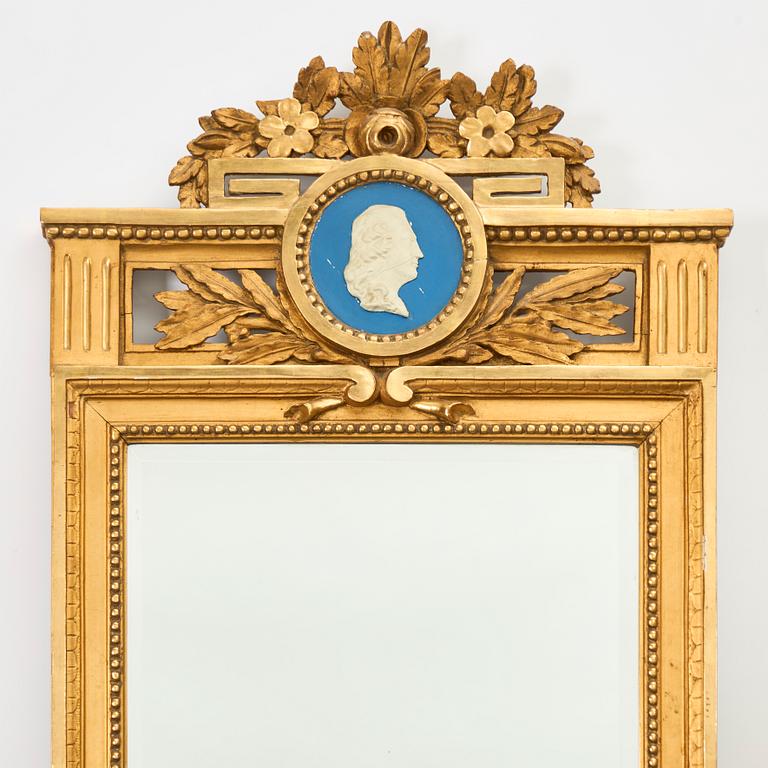 A Gustavian giltwoos mirror by J. Åkerblad (master in Stockholm 1758-99).