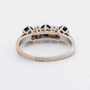 RING 18k whitegold w 3 sapphires 5 x 4 mm and 4 brilliant-cut Diamonds 0,12 ct in total engraved.