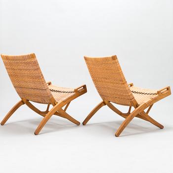 HANS J WEGNER, A pair of JH-512 folding chairs for Johannes Hansen, Denmark, early 1980s. Model designed in 1949.