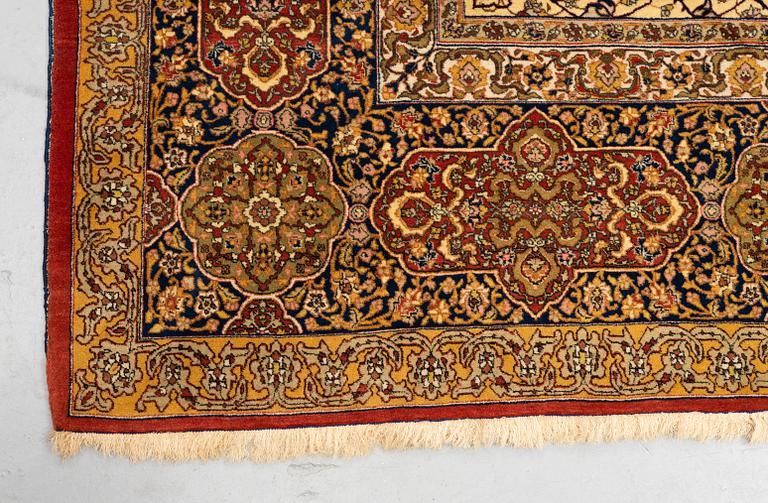 A carpet, semi-antique Tabriz, ca 398 x 290 cm.