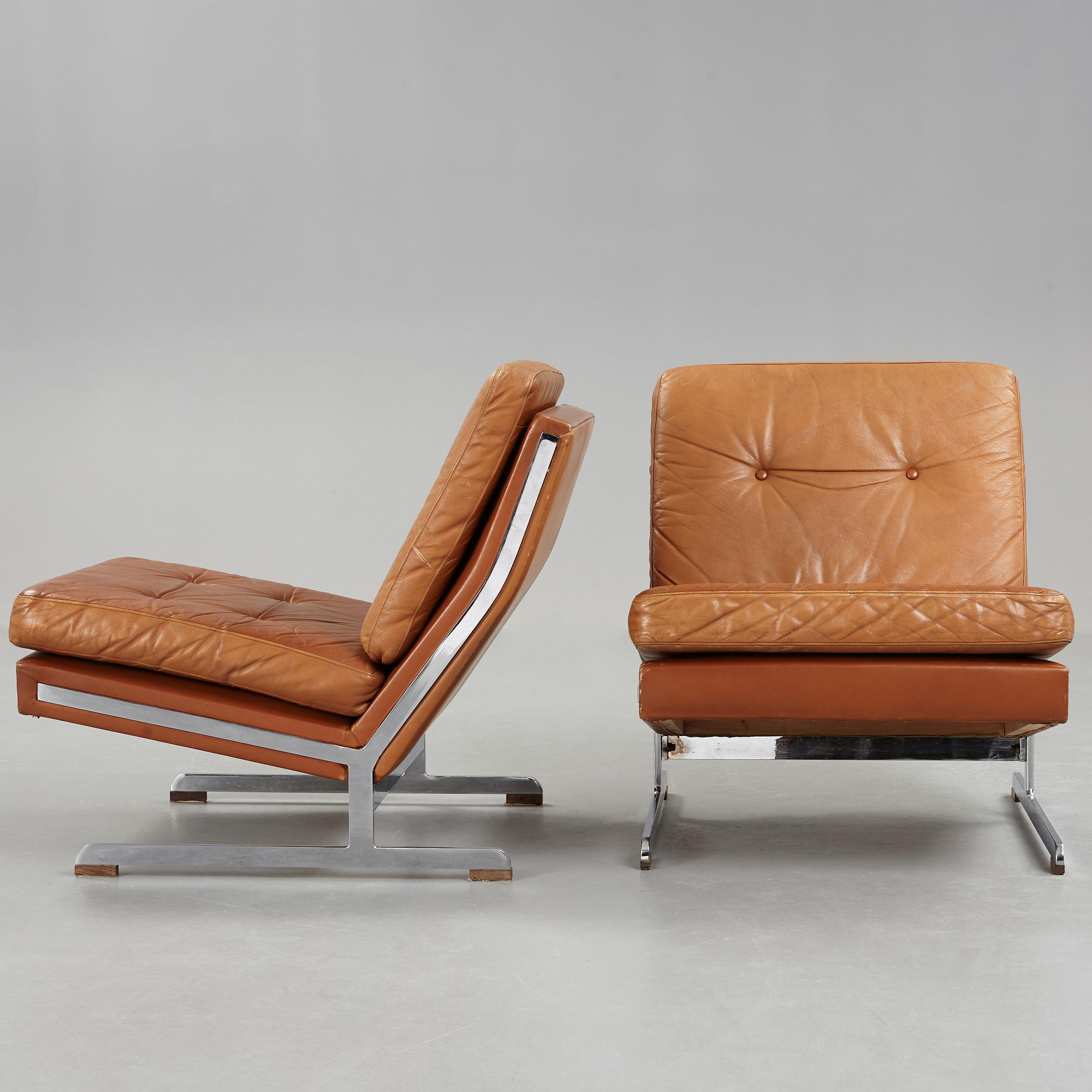 A pair of Poul Nørreklit chromed steel and brown leather easy chairs, Selectform, Denmark 1960's.
