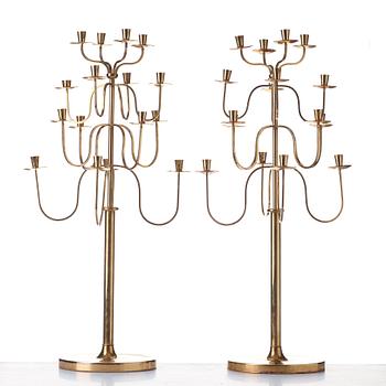 Svenskt Tenn, a pair of Swedish Modern brass candelabra, 1940-50's, probably designed by Josef  Frank.