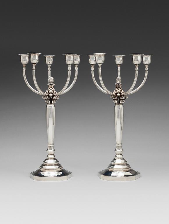 A pair of Johan Rohde sterling candelabra, Georg Jensen, Copenhagen, Jensen & Wendel 1945-51. Design nr 474.