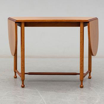 JOSEF FRANK, a model 1333 mahogany table from Firma Svenskt Tenn.
