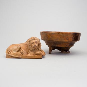 A pottery figurine and a aspic shape 19th century.