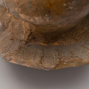 A gilt terracotta sculpture signed Matti Haupt.