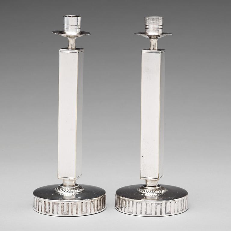 KARL WOJTECH, a pair of Swedish Grace candlesticks, 1920's-30's.