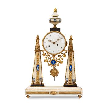 1669. A Louis XVI late 18th century mantel clock.
