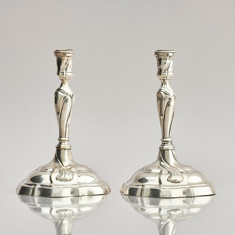 A pair of German silver Rococo candlesticks, marks of Johann Jacob Baur, Augsburg 1777-1779.
