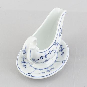 A 'Blue Fluted Plain' / 'Musselmalet' porcelain sauce boat, Royal Copenhagen, model 200, 1893-1900.