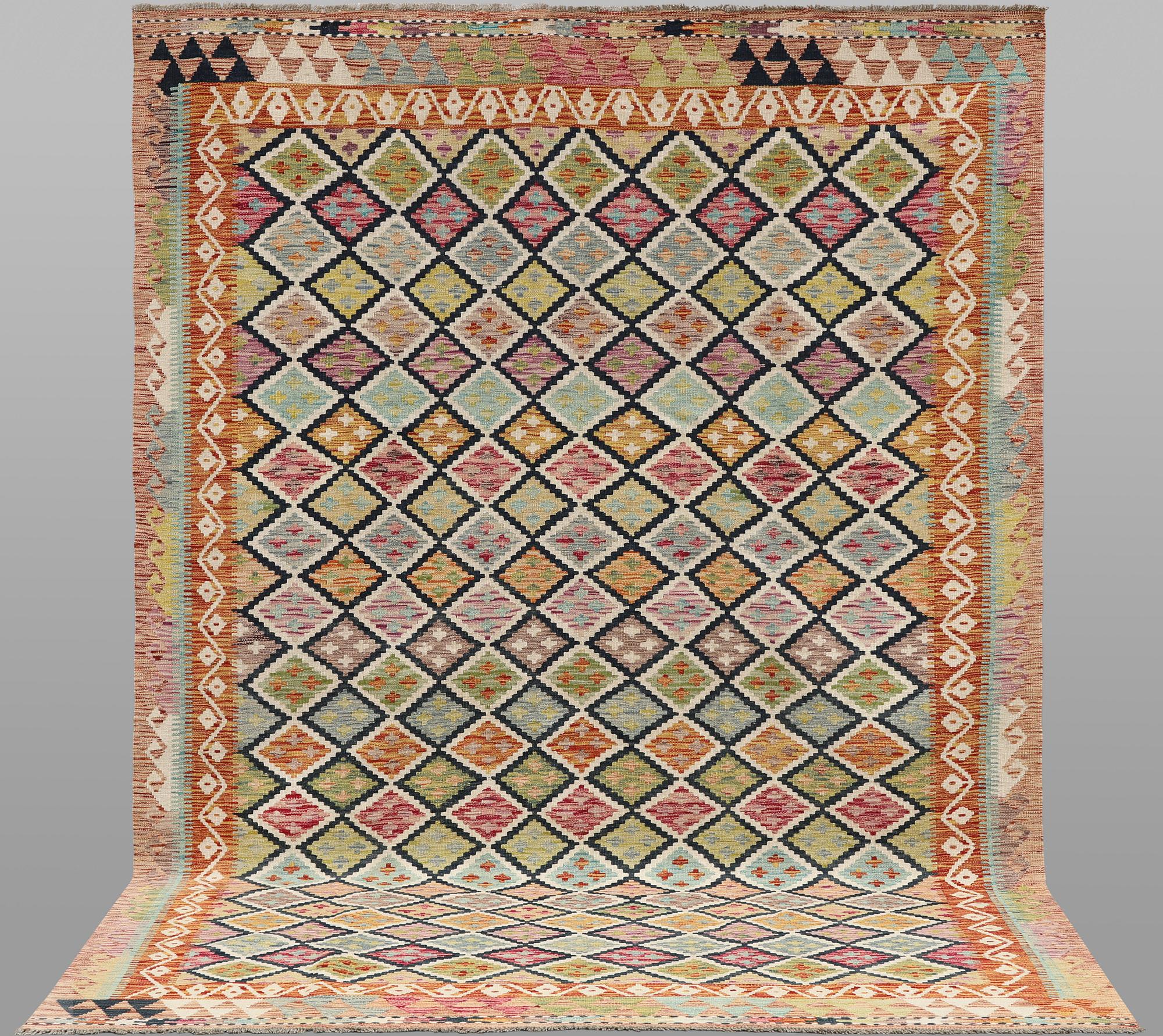 A Kilim rug, approx. 297 x 198 cm.