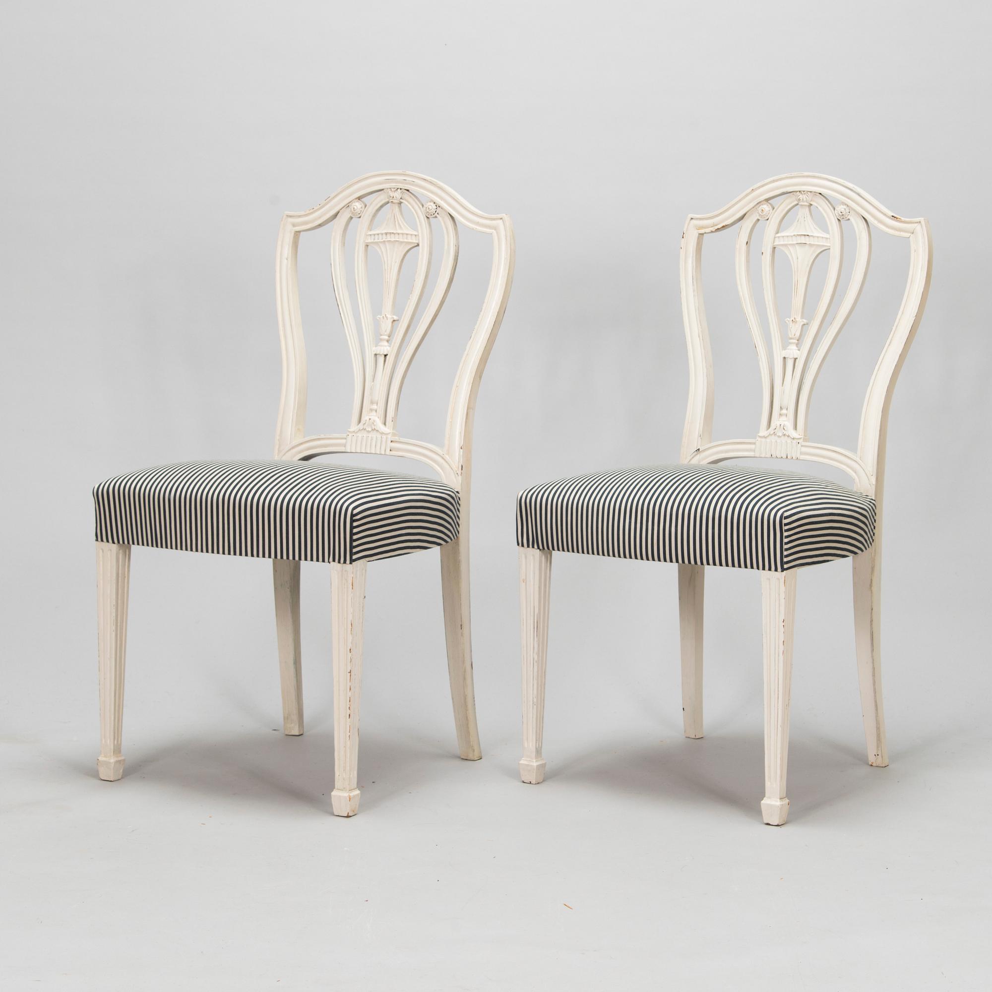 Four George III style chairs, early 20th century.