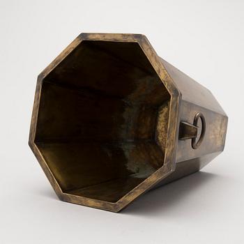 A patinated brass champagne bucket from the first half of the 20th Century.