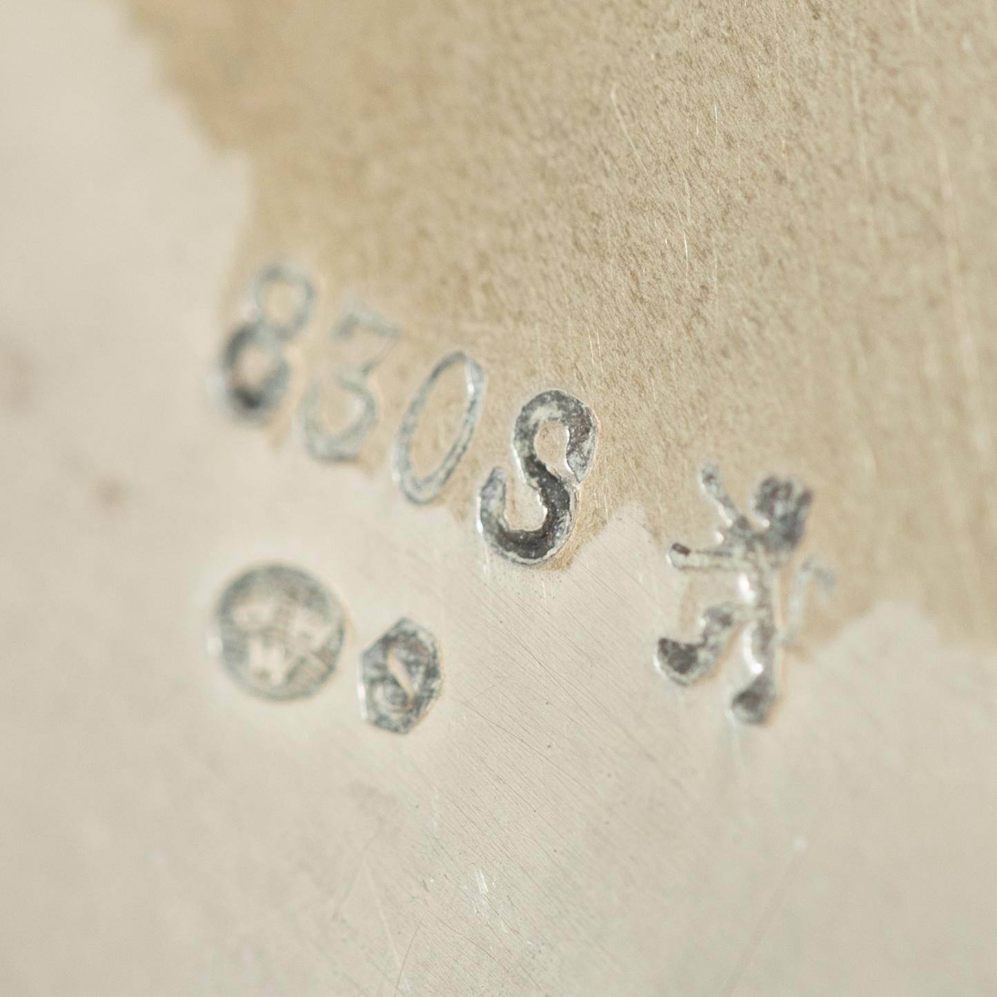 A Norwegian silver Rococo style coffee pot, cream jug, and sugar bowl, Norsk Filigransfabrikk, Oslo circa 1920.