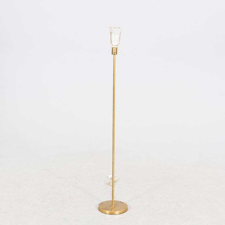 An NK 1960s brass floor lamp.