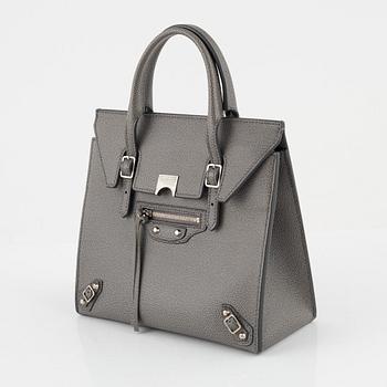 Balenciaga, a 'Paper Flap mini' bag.