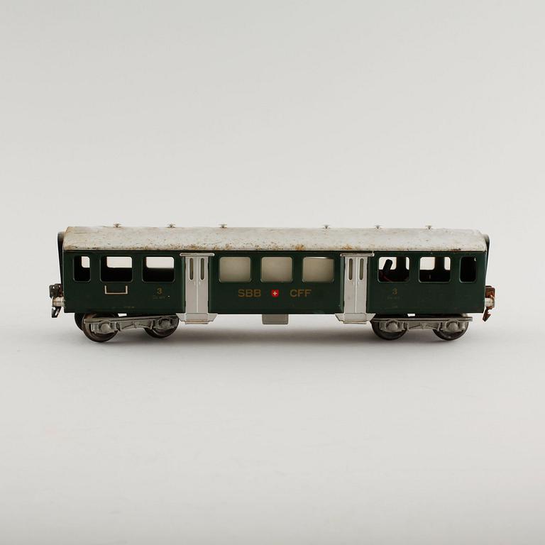 A 1940/50s model train set of 31 pcs in O-scale made by HAG, Switzerland.