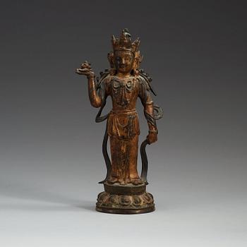1298. A gilt bronze figure of a standing Maitreya Bodhisattva, Ming dynasty (1368-1644).