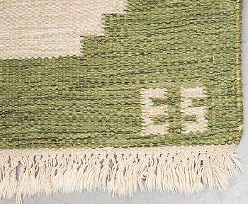 A carpet, flat weave, ca 241,5 x 172,5-175,5 cm, signed ES.