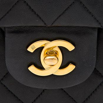 A Black Double Flap Bag.