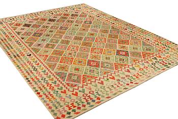 A Kilim carpet, c. 390 x 306 cm.
