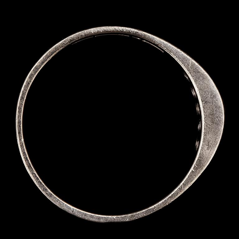 RING, 18k vitguld med åttkantsslipade diamanter tot ca0,20ct. Cedstam, Stockholm, 1981. Vikt 3,4g.