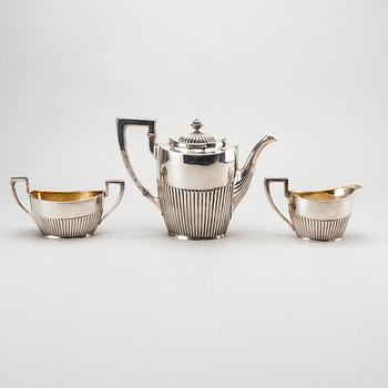 A three piece silver coffee service mark of CG Hallberg Stockholm 1916, weight 896 gram.