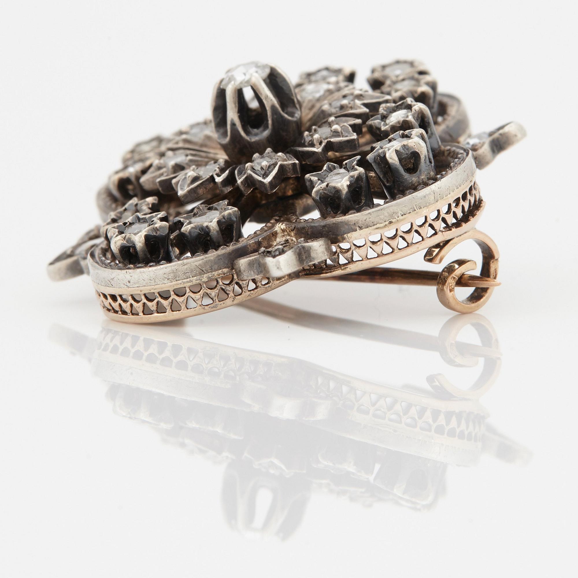 A BROOCH.