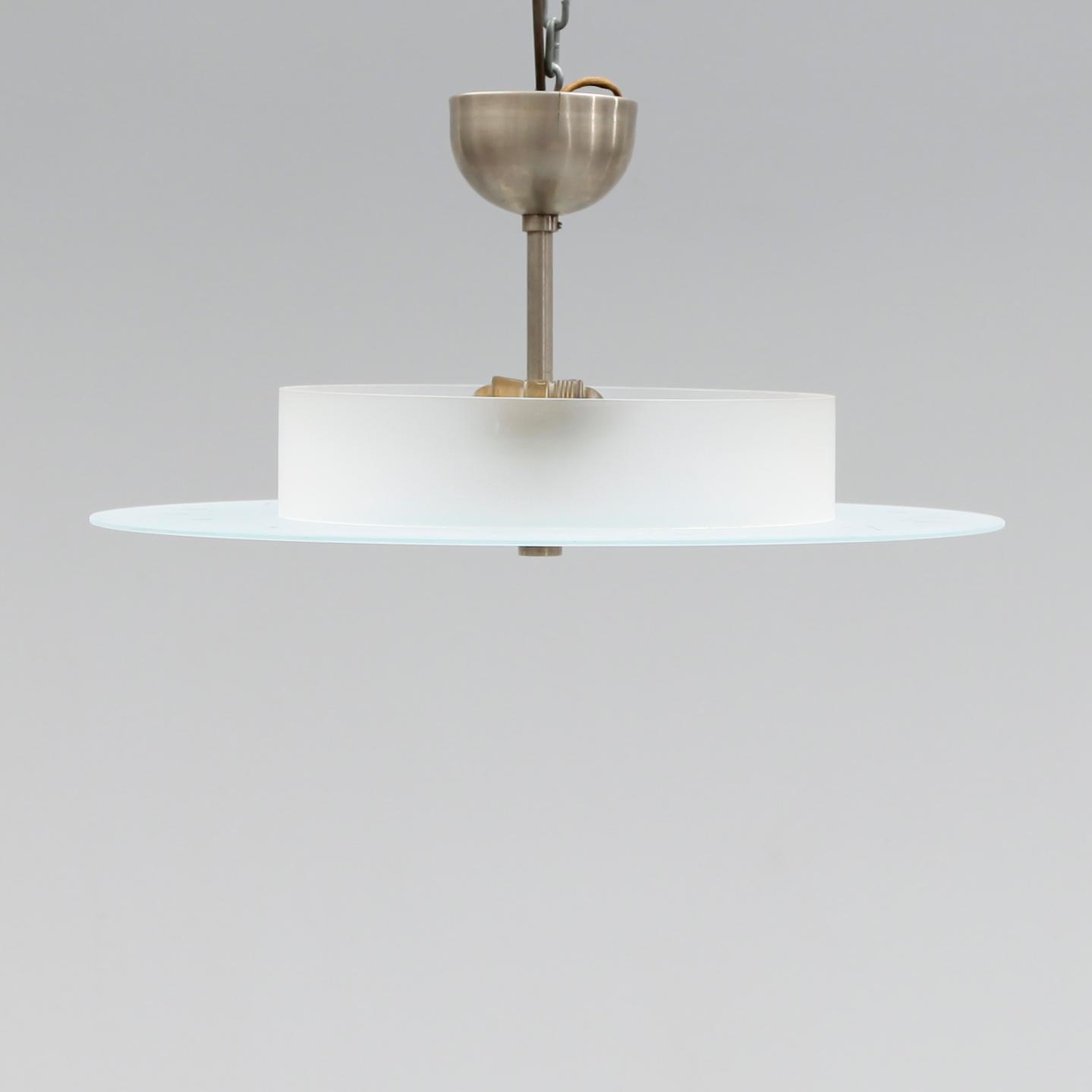 TAKLAMPA, 1900-talets mitt.