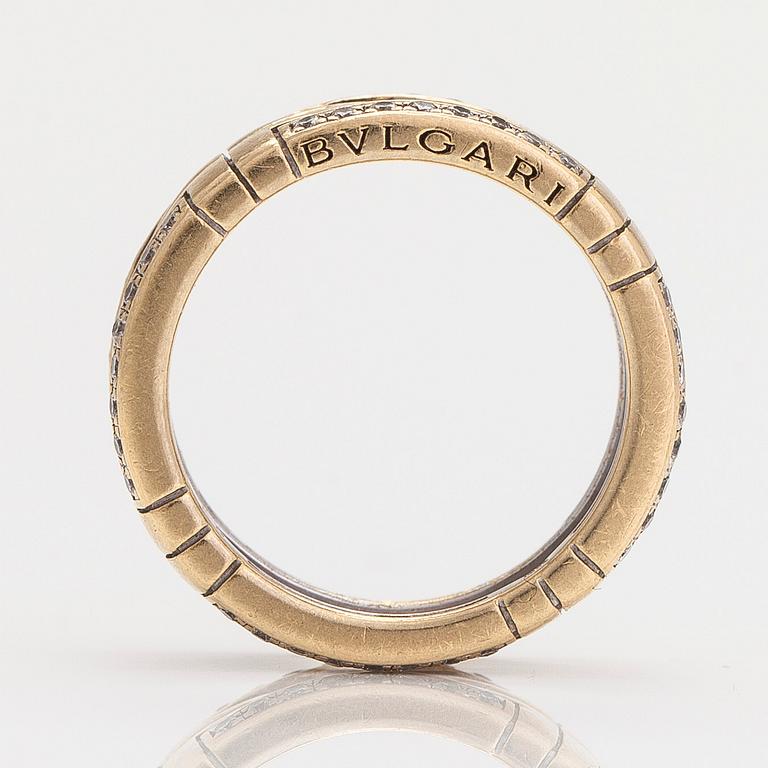 Bulgari, an 18K gold 'Parentesi' ring with diamonds, ca 0.25 ct in total.