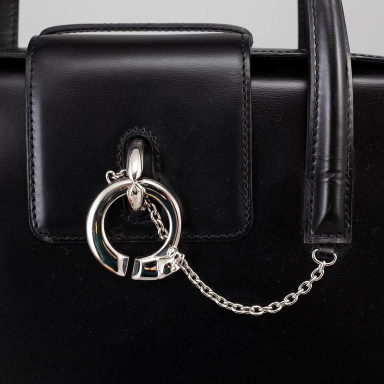 CARTIER, a bag.