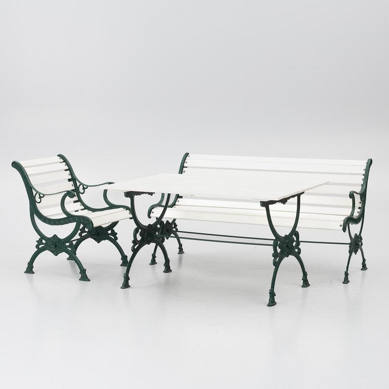 Garden bench, armchair and table, 20th century.